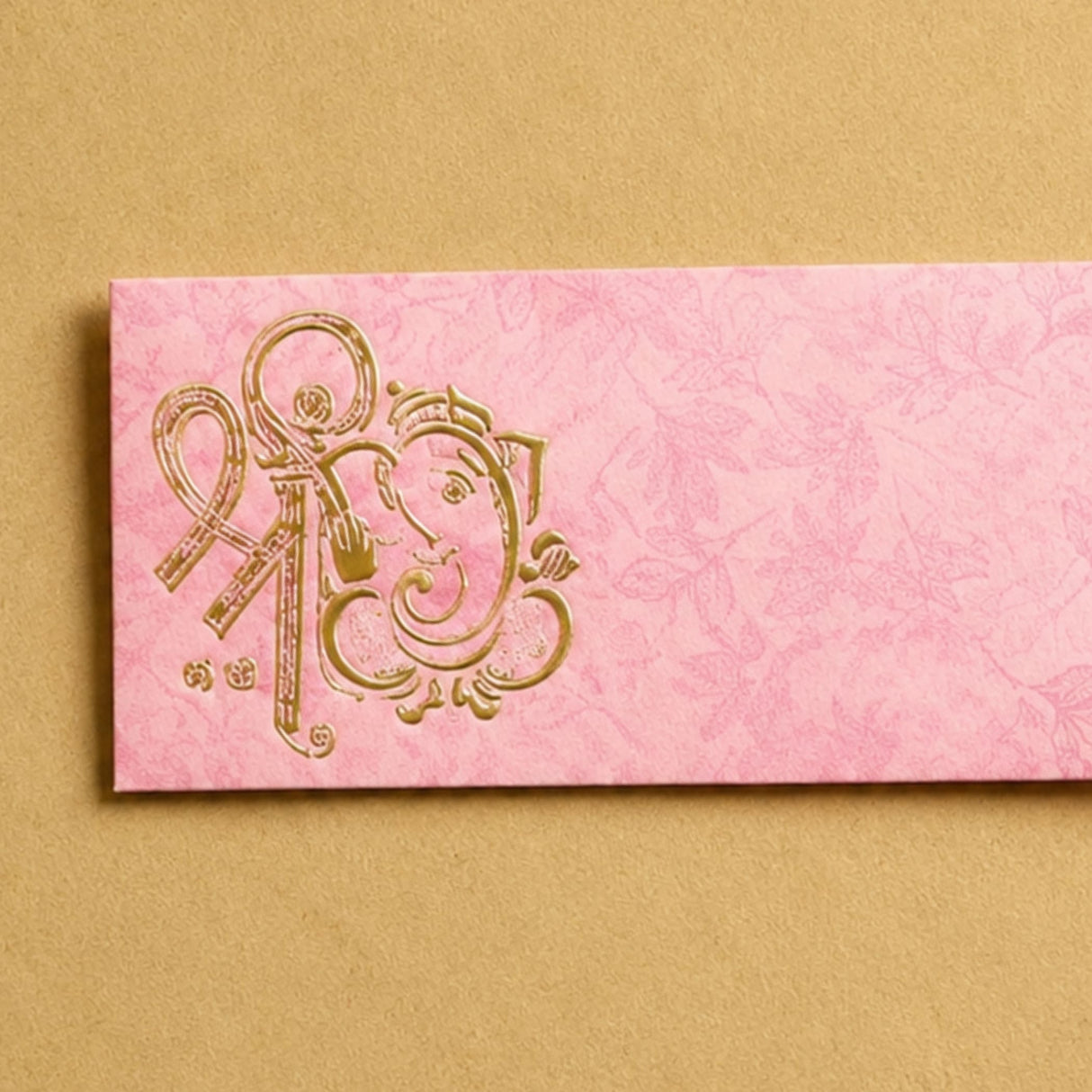 Pink textured money envelope with gold foil embossed ganesha design for indian wedding and cash gift holder