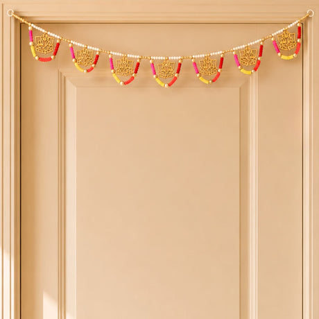 A decorative golden lotus-themed ganesha multicolor bead door toran with pink red and yellow beads for festive decor