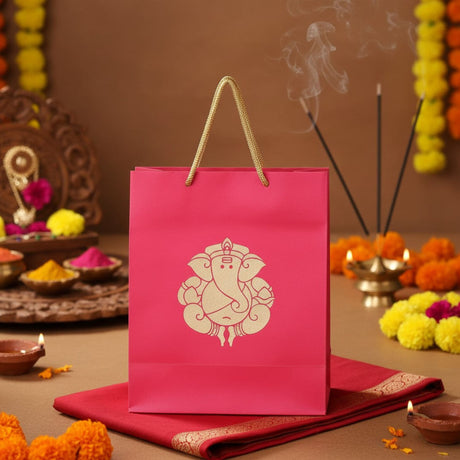 Vibrant pink Ganesha paper carry bag with gold handle, 8x4x10 inch