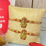 Designer Ganesha Rakhi Gift Hamper for Brother & Bhabhi - Includes 2 Rakhi Bracelets, Chocolates, Diary, Pen, Roli Chawal & Gift Box, Symbolizing Good Luck & Growth