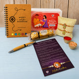 Designer Ganesha Rakhi Gift Hamper for Brother & Bhabhi - Includes 2 Rakhi Bracelets, Chocolates, Diary, Pen, Roli Chawal & Gift Box, Symbolizing Good Luck & Growth