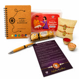 Designer Ganesha Rakhi Gift Hamper for Brother & Bhabhi - Includes 2 Rakhi Bracelets, Chocolates, Diary, Pen, Roli Chawal & Gift Box, Symbolizing Good Luck & Growth