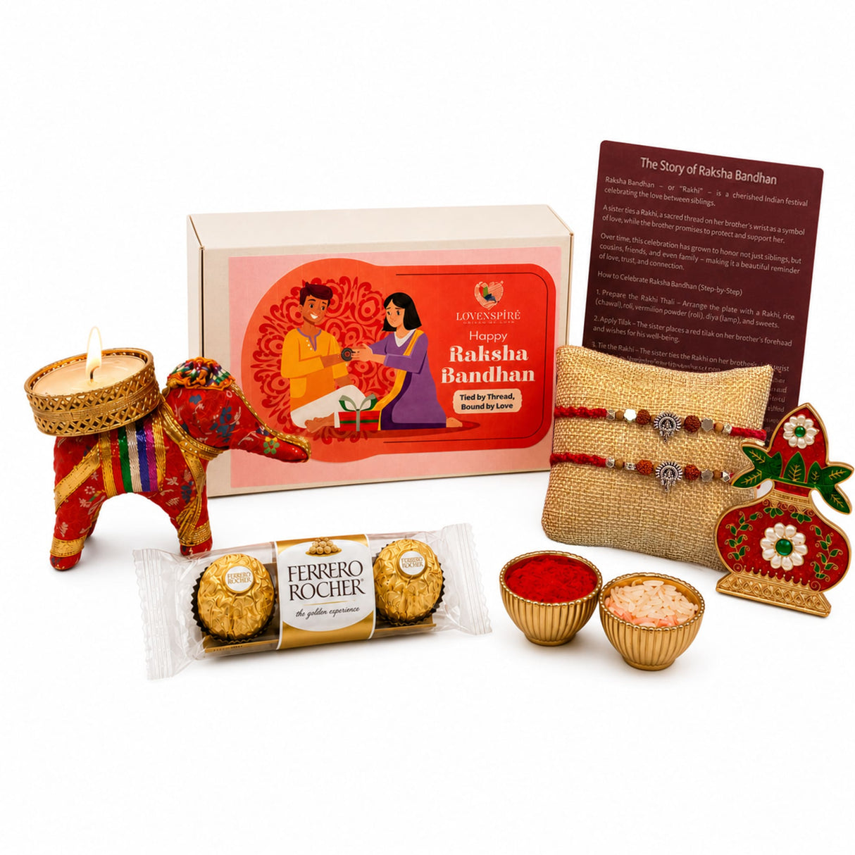 Red and gold decorative elephant candle holder with intricate patterns included in designer ganesha rakhi gift hamper