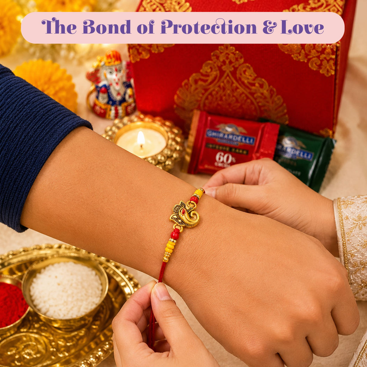 Gold-colored ganesha-themed rakhi with red and yellow beads on red thread in raksha bandhan brocade gift box hamper