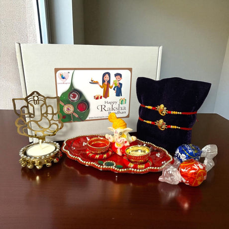 Ganesha Rakhi Gift Hampers for Raksha Bandhan with traditional puja set and accessories