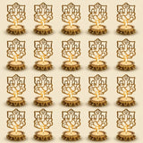Golden ganesha shadow diya tea light candle holder with intricate cut-out designs and small bells for diwali decor