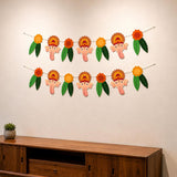 A cheerful two-row garland with pink elephant faces and orange yellow floral headdresses for ganesh chathurti decor