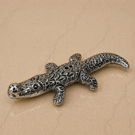 Minimalist silver plated alligator shaped incense stick holder with detailed engravings for temple and living room use