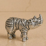 Silver-toned minimalist german silver rhinoceros incense stick holder with textured surface for temple and home decor