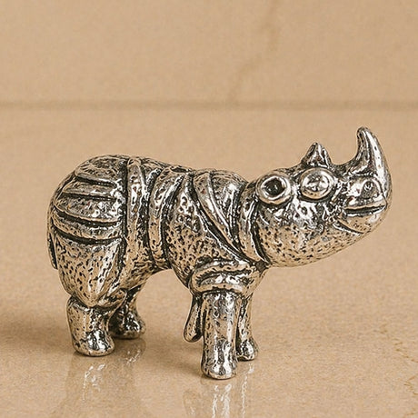 Silver-toned minimalist german silver rhinoceros incense stick holder with textured surface for temple and home decor