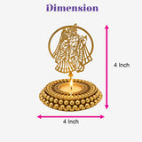 Golden ornamental ghungroo tea light candle holder with intricate couple cut-out and beaded base for diwali pooja decor