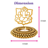 Gold-colored metal ganesha-themed ghungroo tea light holder with intricate cut-out design and beaded base for diwali decor