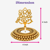Gold-colored intricately designed ghungroo tea light candle holder with seated deity motif and beaded base for Diwali pooja