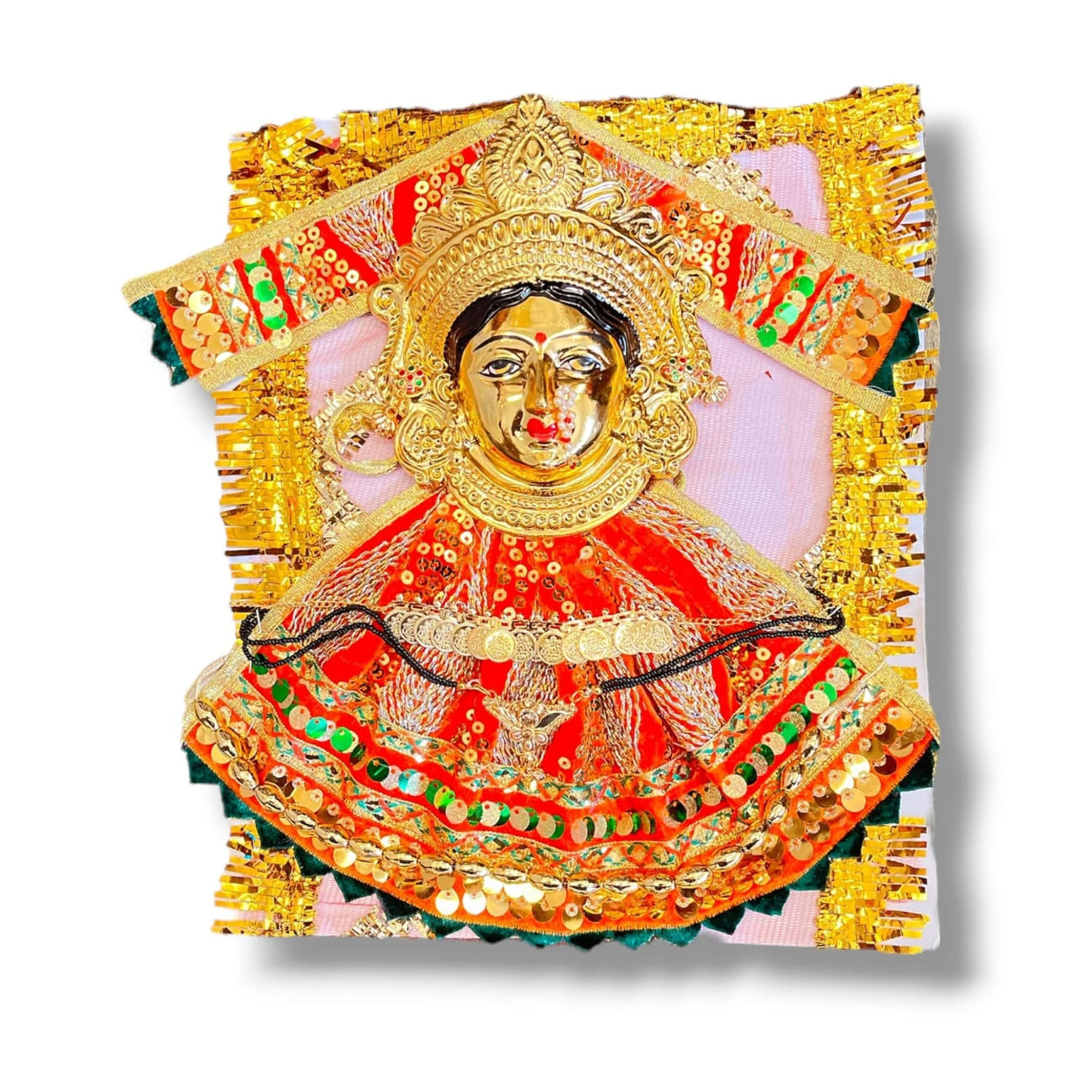 Ornate golden Goddess Mahalaxmi figurine symbolizing divine prosperity and grace