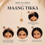 Gold-plated chand maang tikka for women with intricate filigree design and dangling pearl accents for bridal wear
