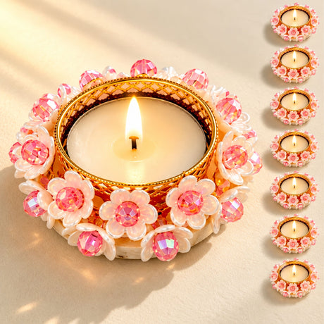 Pink floral tealight candle holder with gold-tone metal frame and faceted crystal accents for elegant decor