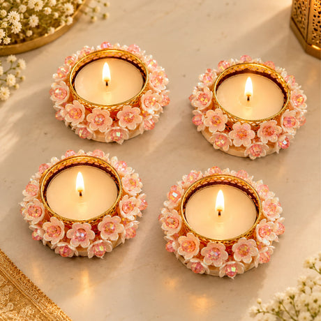 Four ornate pink and gold floral round tealight candle holders with rhinestones for weddings parties and home decor
