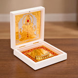 Gold plated laxmi ganesha idol with red gemstone accents in ornate white box with red and gold fabric for pooja decor