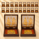 Gold plated laxmi ganesh photo frame with charan paduka in ornate dark wood box with red velvet lining for home temple decor