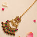 Gold plated chand tikka maang tikka with ornate floral design and vibrant pink green gemstones for traditional weddings