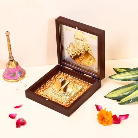 Gold plated sai baba photo frame with charan paduka