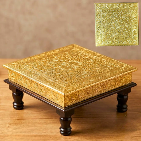 Gold plated wooden chowki with intricate embossed floral and geometric patterns decorative pedestal for pooja mandir