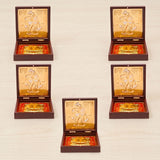 Gold plated radha krishna deity figurines embossed in golden color nestled in dark brown wooden boxes with red linings