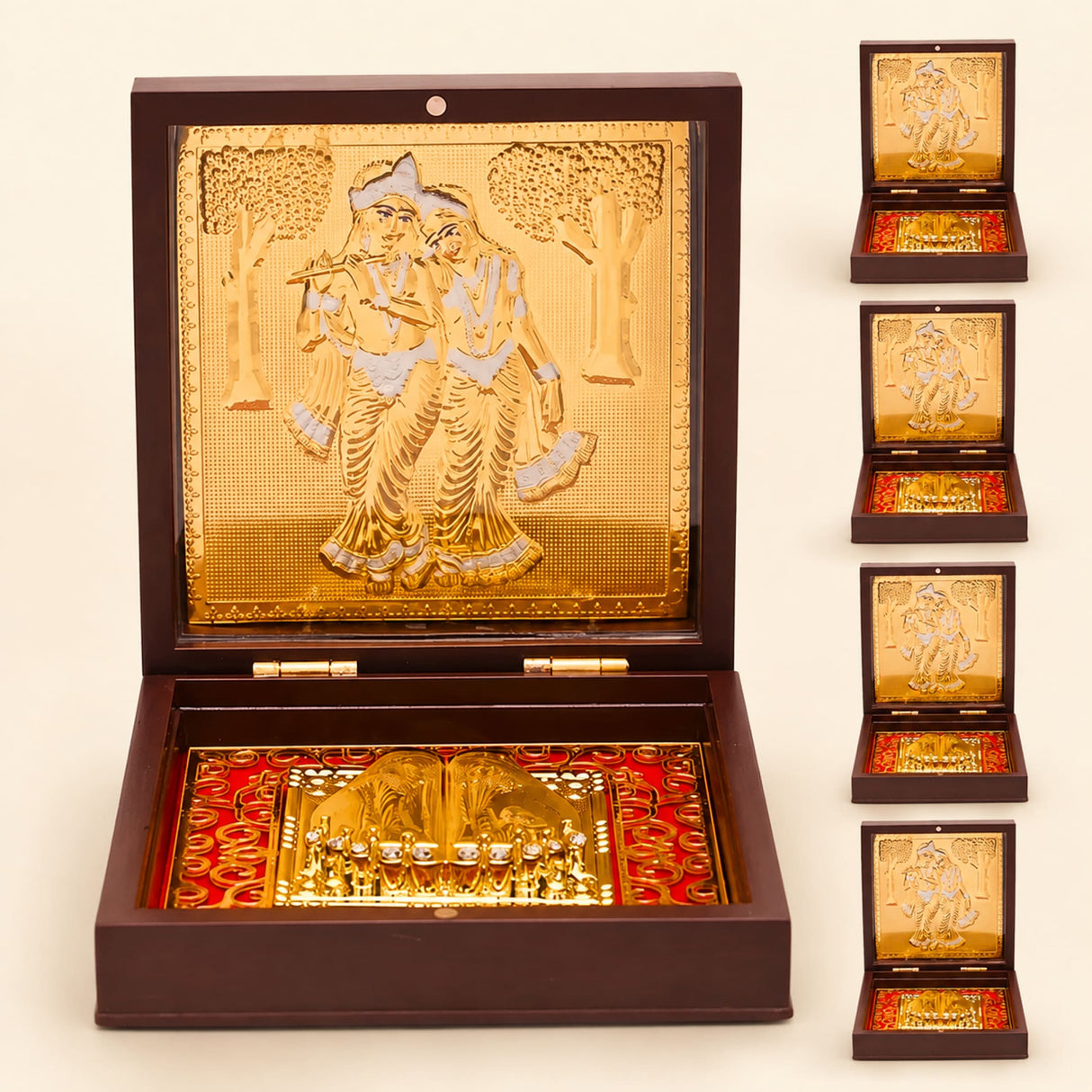 Gold plated radha krishna photo frame with charan paduka featuring a golden ornate box with red patterned interior lining
