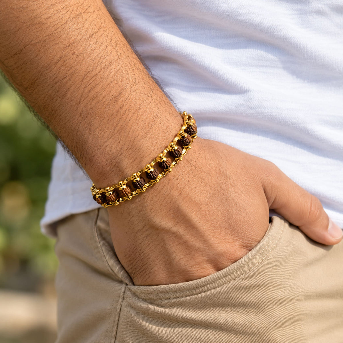 Gold-plated 5 face original rudraksha beads bracelet for men featuring a gold-colored chain and dark brown textured beads