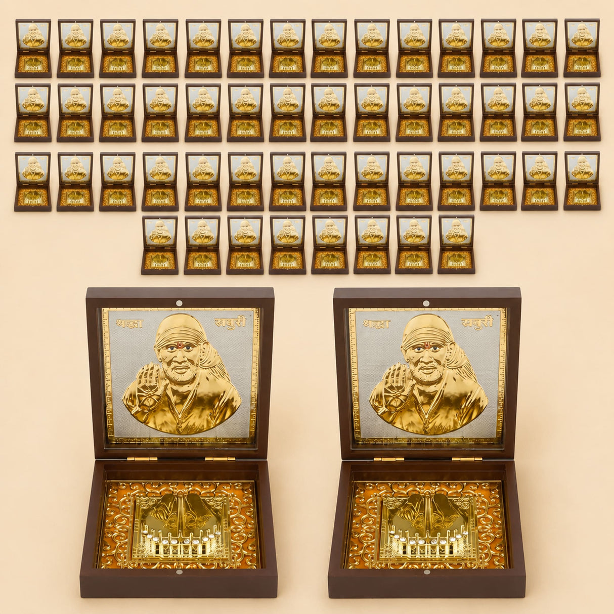 Gold plated sai baba photo frame with charan paduka in a golden portrait inside a dark wooden box with gold detailing