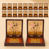 Gold plated shrinath krishna deity figurines in dark brown wooden boxes with red and gold patterned interiors for home temple decor