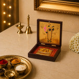 Gold plated shrinath krishna photo frame with golden ornate box featuring deity illustration and red fabric lined compartment