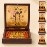 Gold plated shrinath krishna deity figurine in dark brown wooden box with red and gold interior for home temple decor