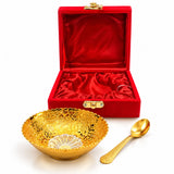 Golden two-piece german silver bowl and spoon set with intricate floral and dragon motifs for pooja and festive gifts