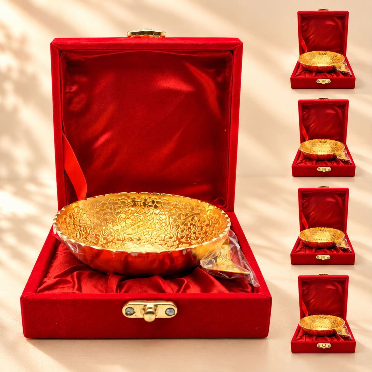 Golden ornate german silver bowl in a red velvet box from 2-piece dessert serving set for pooja and festive gifts