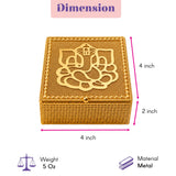 Decorative golden metal gift box with detailed ganesha design on lid and beaded edges for traditional Indian festivals