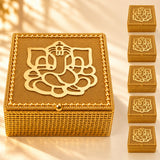 Decorative golden gift box with ganesha design featuring intricate mesh texture and beaded edges for festive use