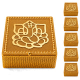 Decorative golden gift box with ganesha design featuring textured beaded border and intricate cutout for festive gifts