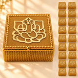 Decorative golden metallic gift box with intricate ganesha design and beaded edges for indian festive occasions