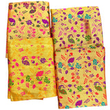 Unstitched golden meenakari blouse piece in vibrant yellow silk with intricate floral and peacock motifs for Indian gifts