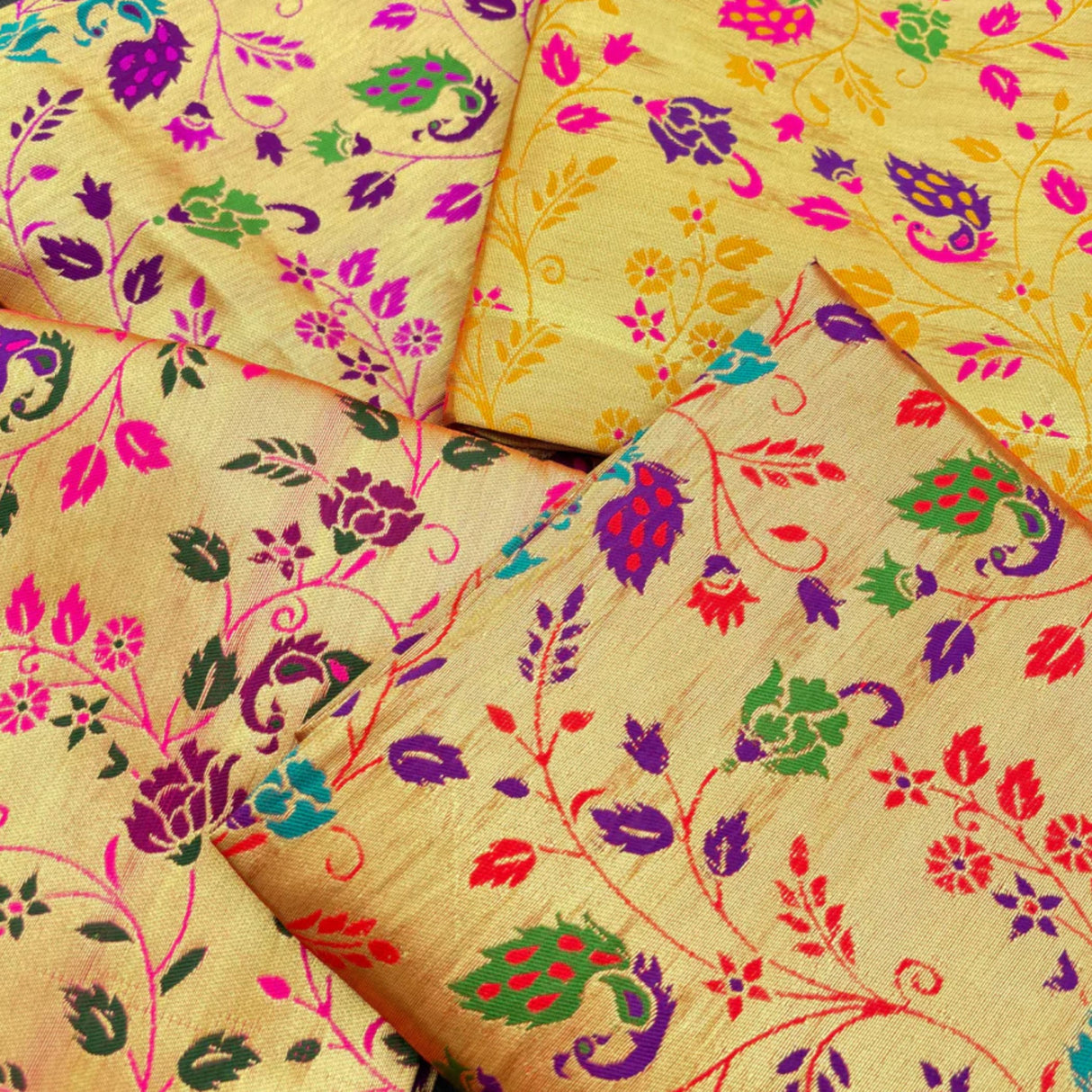 Unstitched golden meenakari blouse piece in vibrant yellow silk with intricate multicolor floral and vine patterns for saree and gifts