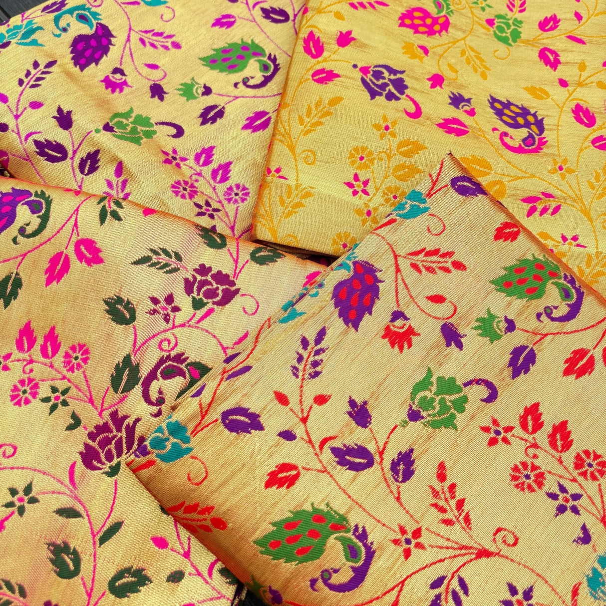 Unstitched golden meenakari blouse piece in vibrant gold silk with intricate multicolored floral and paisley patterns