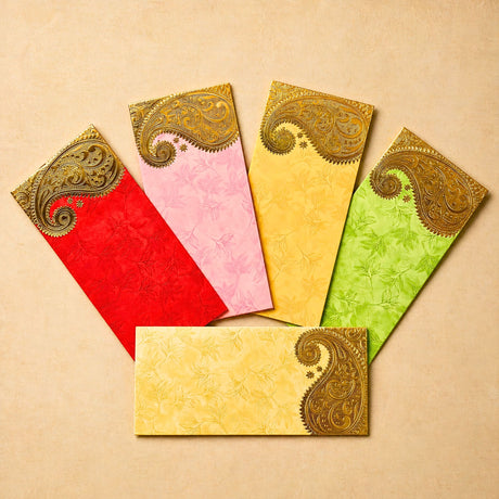 Set of five colorful textured paper money envelopes with ornate golden paisley designs for indian wedding gifts