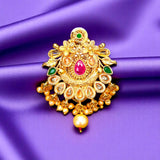Ornate gold sari brooch with colorful gemstones, traditional Indian wedding jewelry