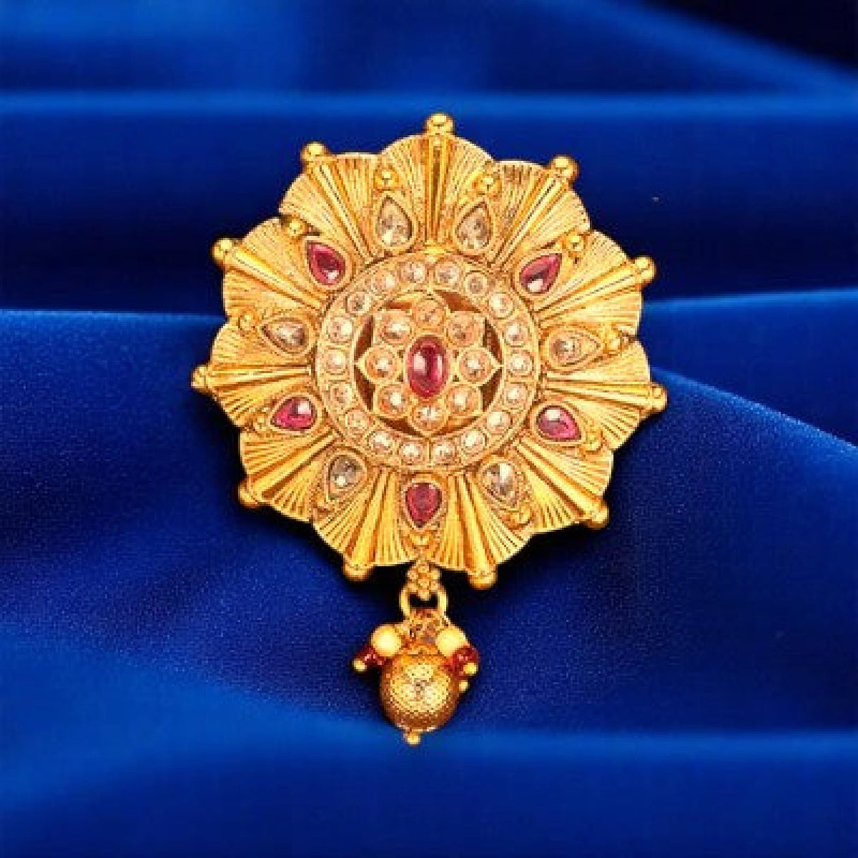 Ornate gold pendant with gemstones from Sari Brooch for Indian Saree wedding jewelry