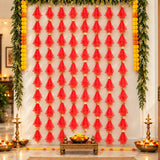 Red sheer fabric tassels with gold metallic connectors on gotta patti net backdrop for diwali eid and wedding decor