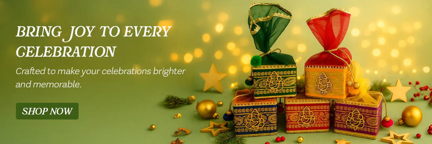 Green and gold gift boxes with festive designs, likely made of cardboard or paper.