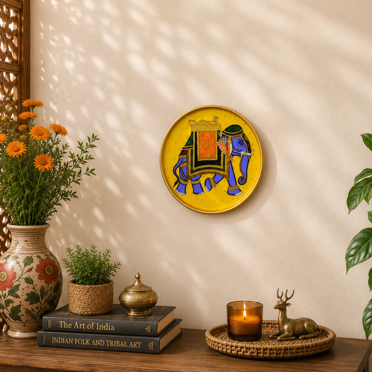 Vibrant yellow wooden circular wall plaque with a hand-painted blue elephant and gold accents for home decor