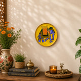 Vibrant yellow wooden circular wall plaque with a hand-painted blue elephant and gold accents for home decor