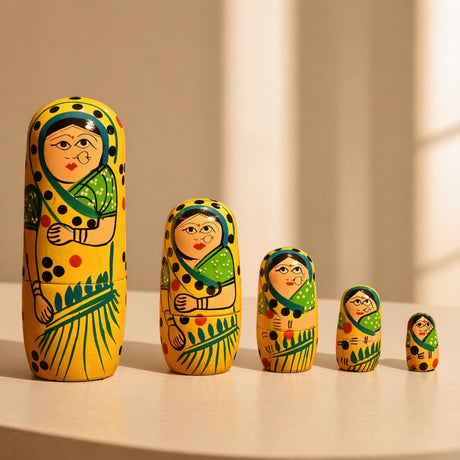 Hand-painted wooden nesting dolls set of 5 with vibrant yellow backgrounds green sari patterns and black polka dots